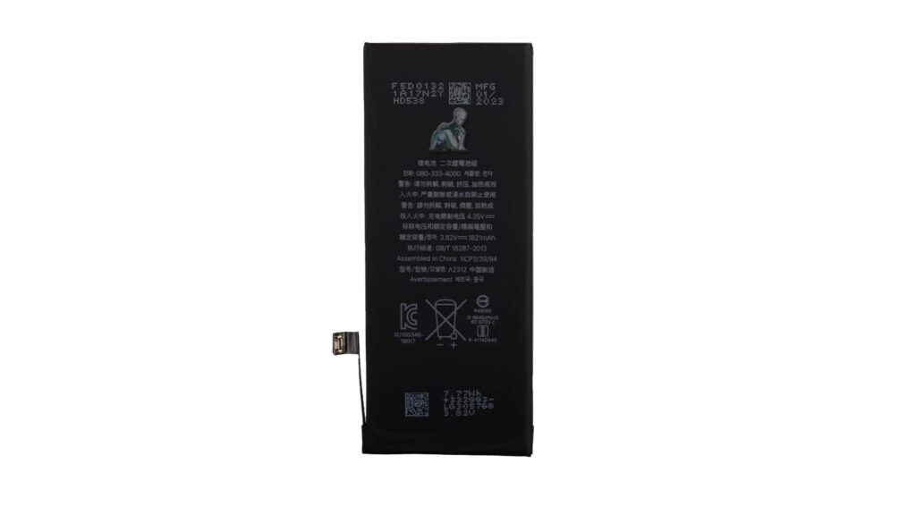 New iPhone battery unit placed on a clean surface with connector flex cable visible and protective labeling intact