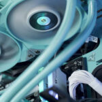 Technician checking computer cooling fans for noise issues, inspecting fan movement and airflow inside a system unit