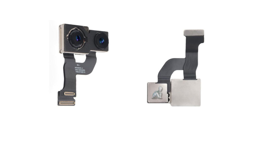 iPhone opened with camera module being replaced, showing internal components during the repair process