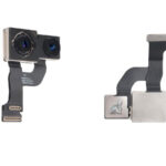 iPhone opened with camera module being replaced, showing internal components during the repair process