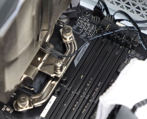 Large CPU heatsink mounted on motherboard to prevent overheating and dissipate heat from processor