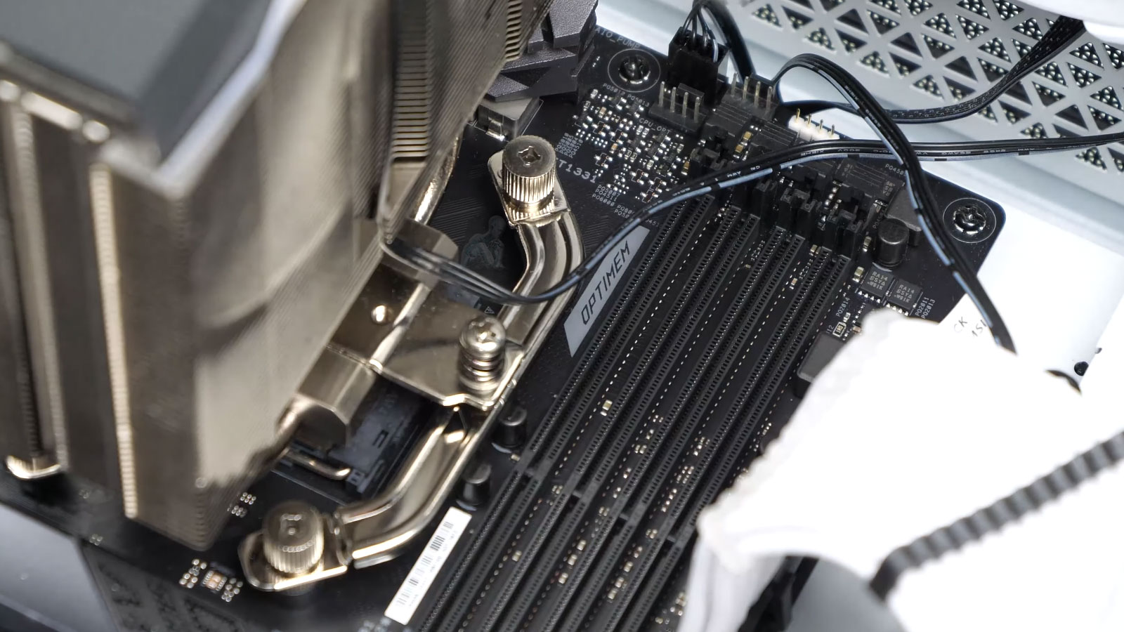 Large CPU heatsink mounted on motherboard to prevent overheating and dissipate heat from processor