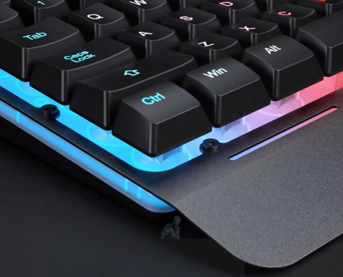 Desktop keyboard with LED backlit keys illuminated during use