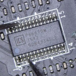 Computer memory slot area on a motherboard with damaged integrated circuits affecting the surrounding board section