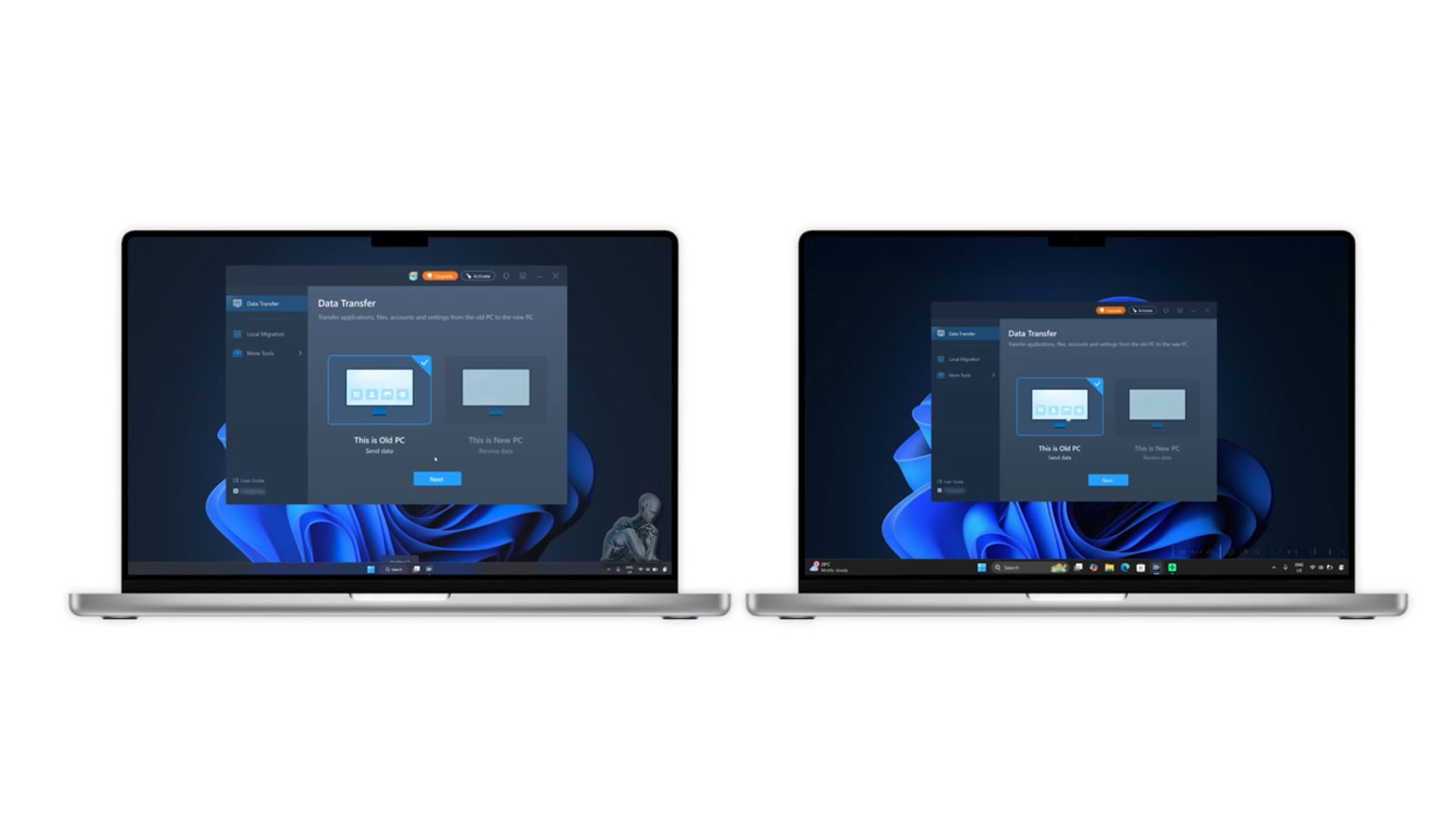 Two laptops placed side by side with a visible data transfer in progress, indicating files being moved directly between systems