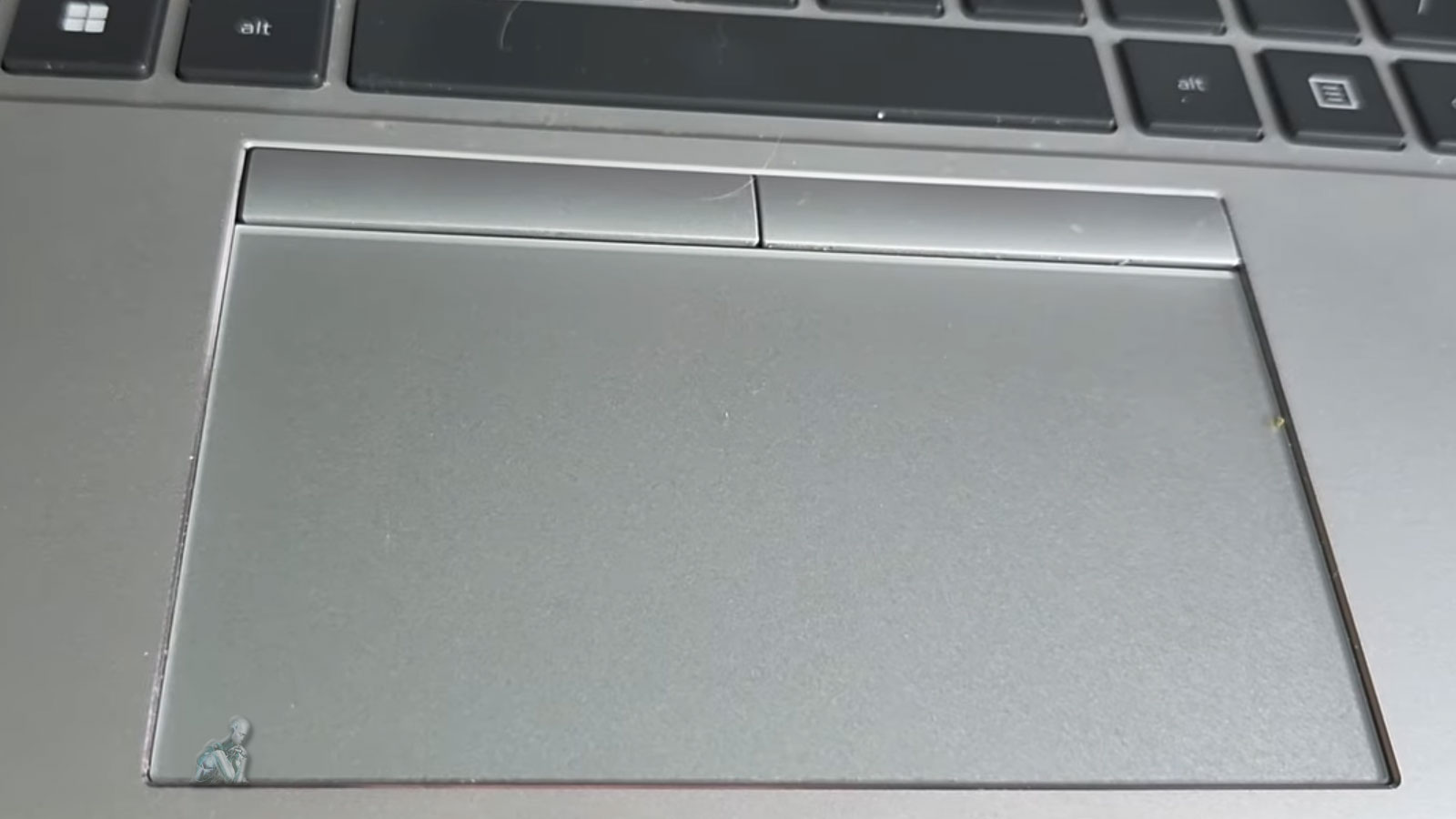 Close-up of a laptop trackpad surface showing the touchpad area used for cursor control and input interaction