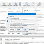 Laptop screen displaying data recovery software scanning a storage device and listing recoverable files in progress