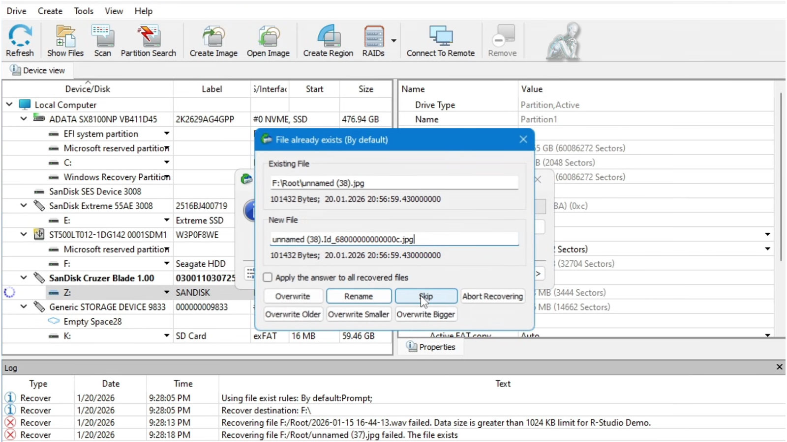 Laptop screen displaying data recovery software scanning a storage device and listing recoverable files in progress