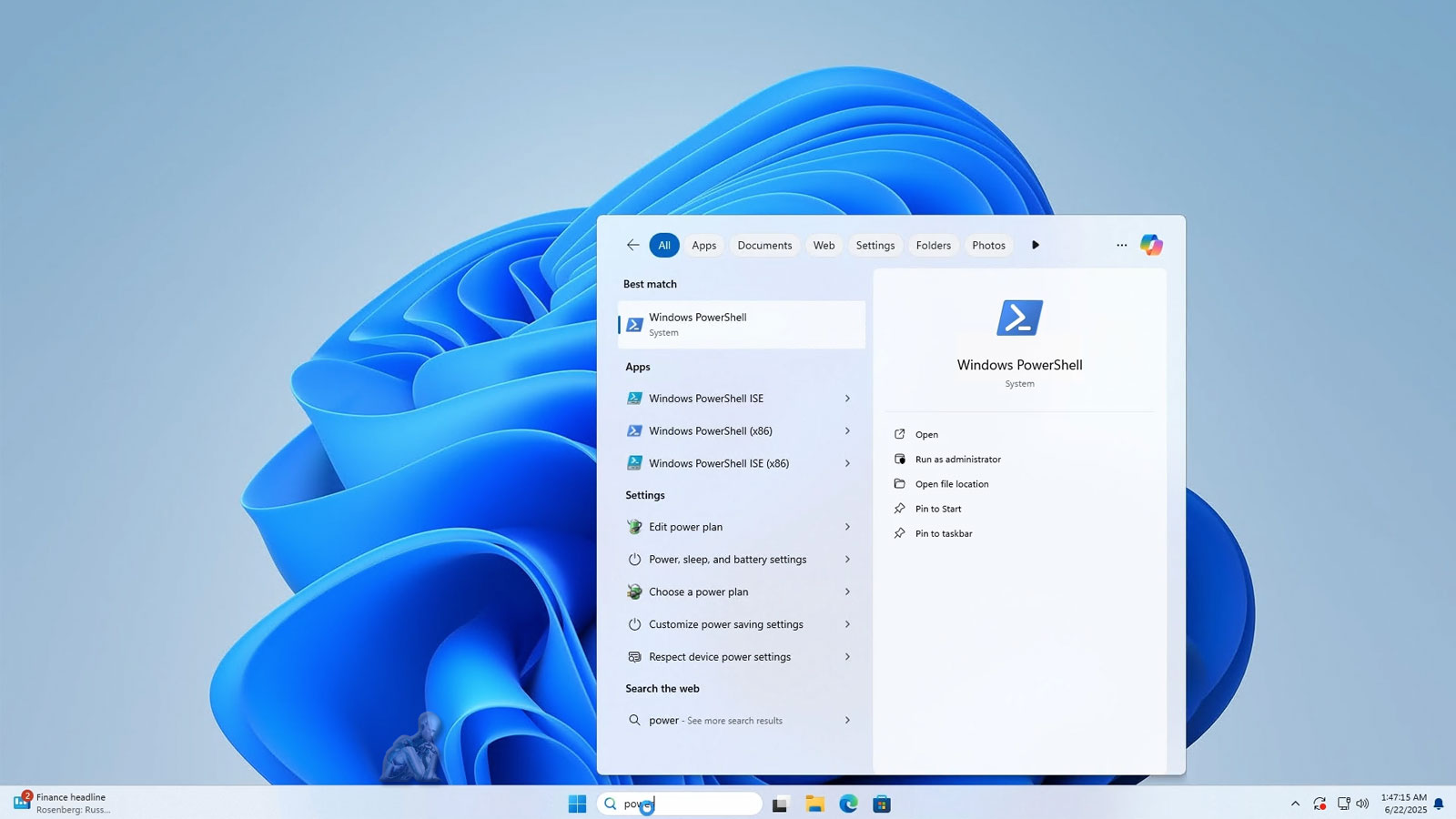Laptop screen showing Windows 11 setup nearing completion with a PowerShell window open for configuration commands