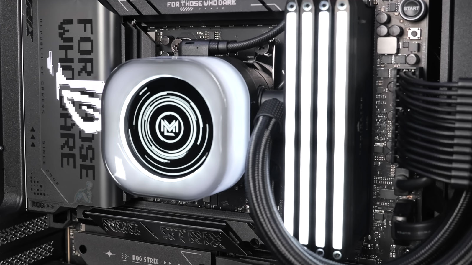 ASUS ROG Strix motherboard inside a custom-built gaming PC running with visible components, active lighting, and system operation