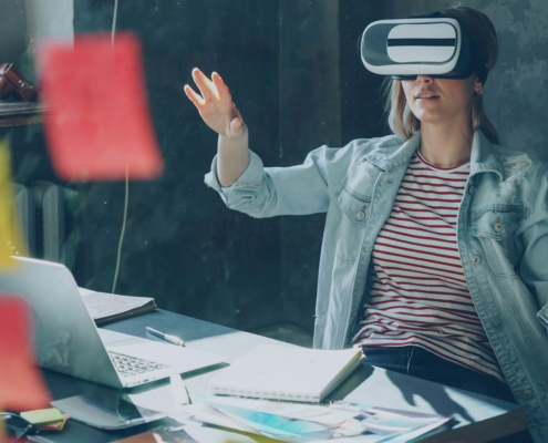 User interacting with virtual reality interface simulating AI diagnostics and digital environments