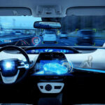 Autonomous car on a highway using onboard sensors and cameras to detect nearby vehicles, track lane positioning, and process real-time driving conditions without a human driver