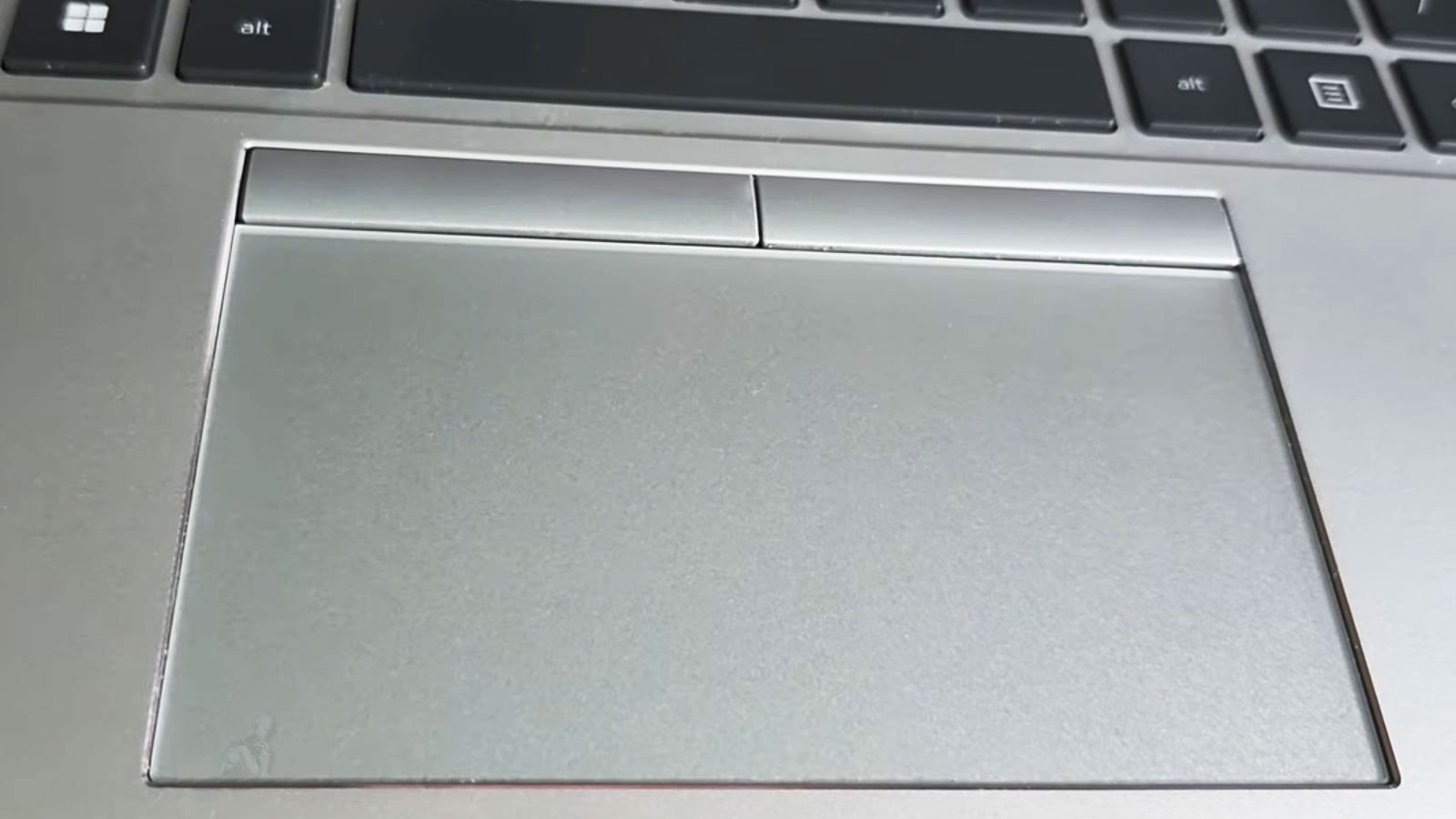 Close-up of a laptop trackpad surface showing the touchpad area used for cursor control and input interaction