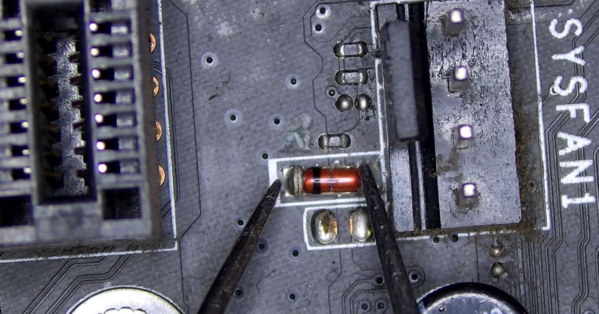 Contact-Computer-Repair-Specialists-in-Miami-for-Hardware-Diagnostics Meter probes positioned across a Zener diode on a circuit board to verify its response, with surrounding components and solder joints visible