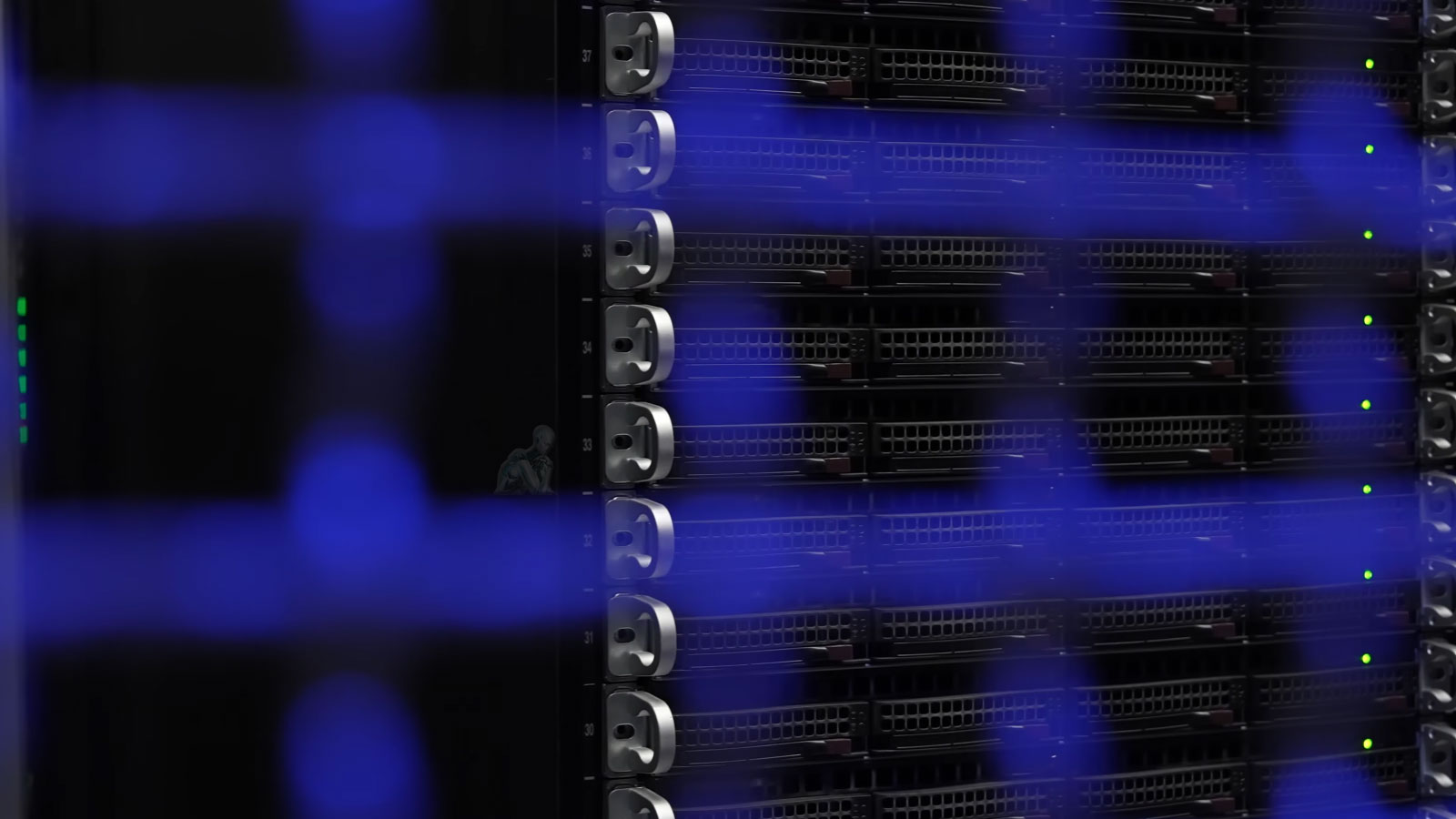 Server rack with multiple active systems and LED indicators during IT installation and network setup in Miami