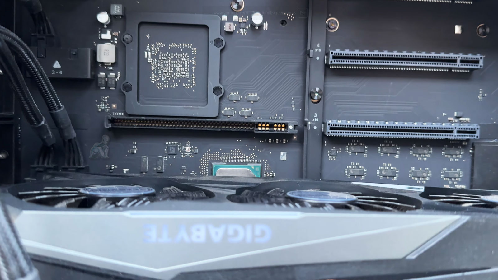 Open Mac Pro with Gigabyte graphics card installed for GPU diagnostics and repair