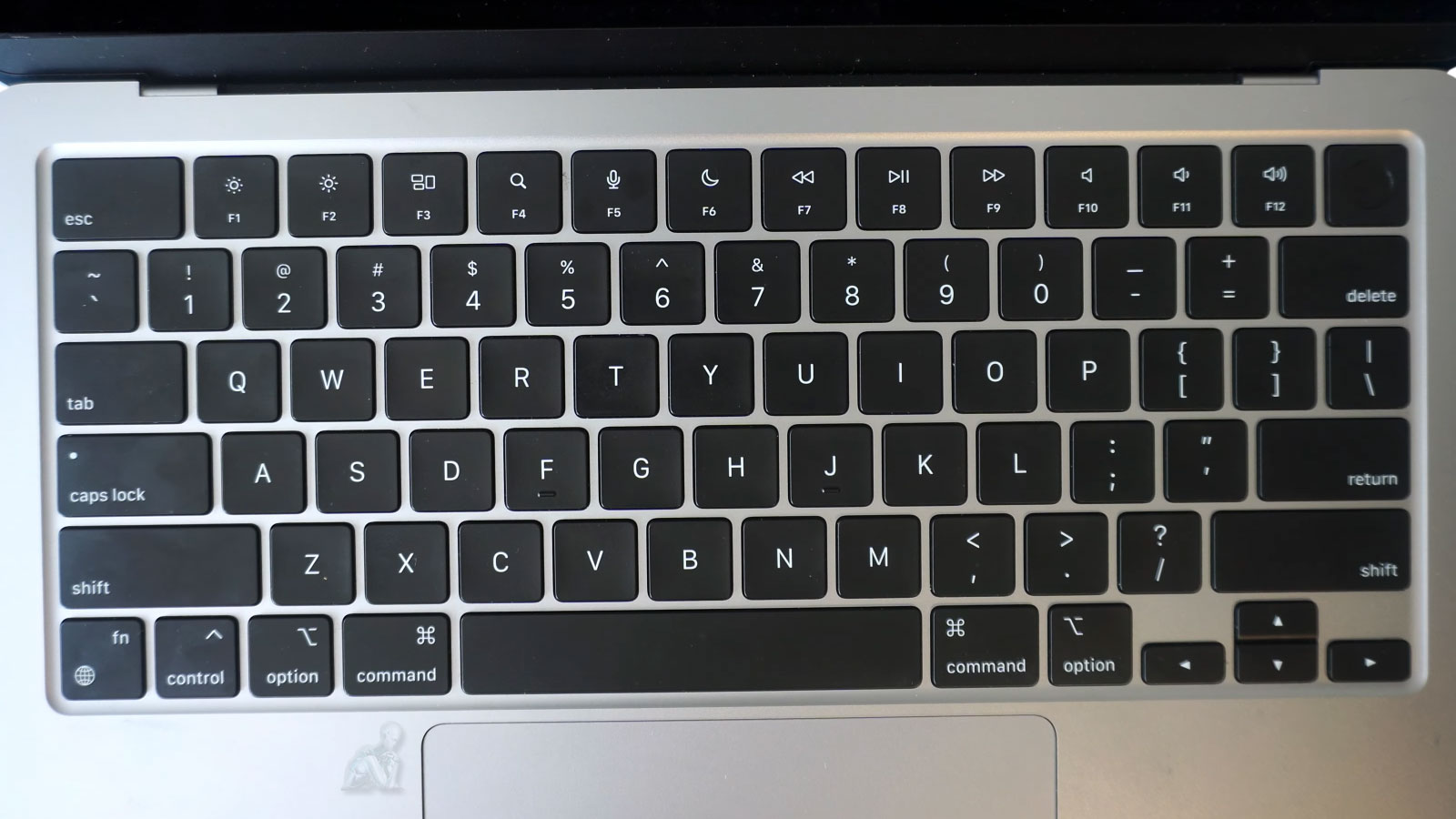 MacBook Air keyboard undergoing repair and replacement process in Miami