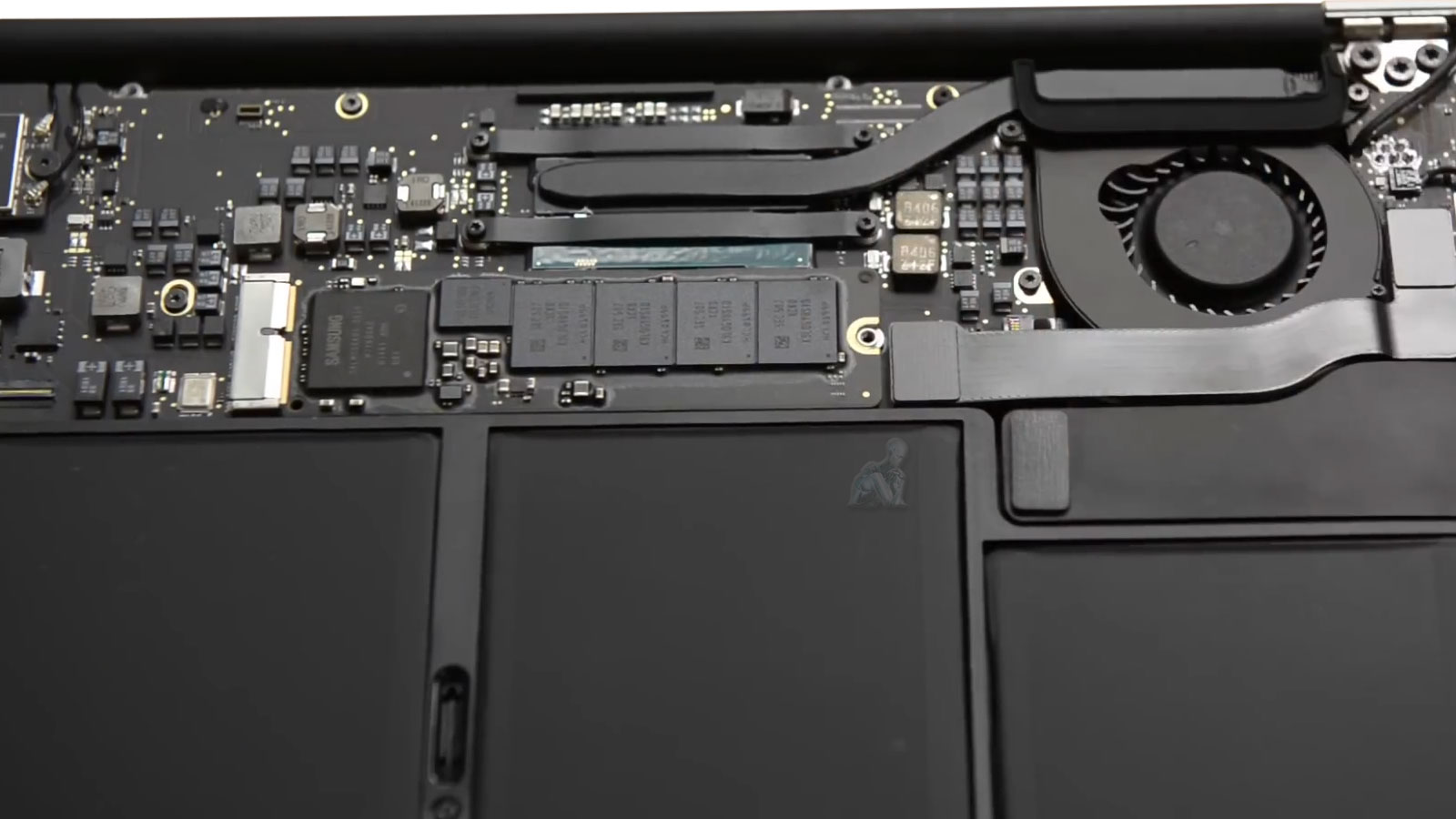 MacBook Air with back cover removed showing proprietary Apple SSD during replacement in Miami