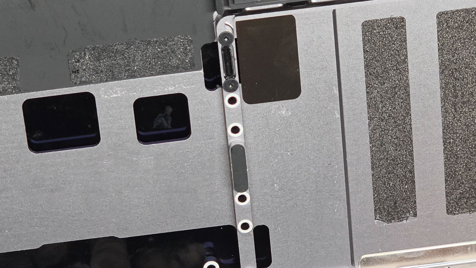 MacBook-Pro-Trackpad-Assembly-Replacement MacBook Pro trackpad assembly exposed and ready for removal during repair