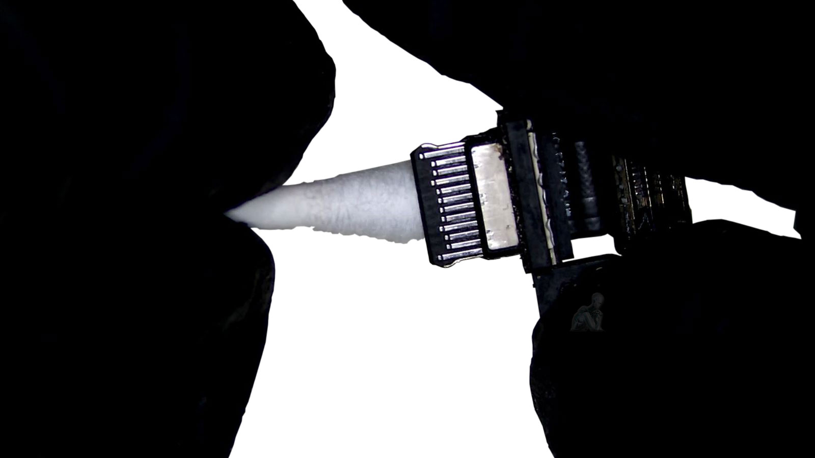Technician cleaning MacBook Pro USB-C charging port with alcohol and cotton swab