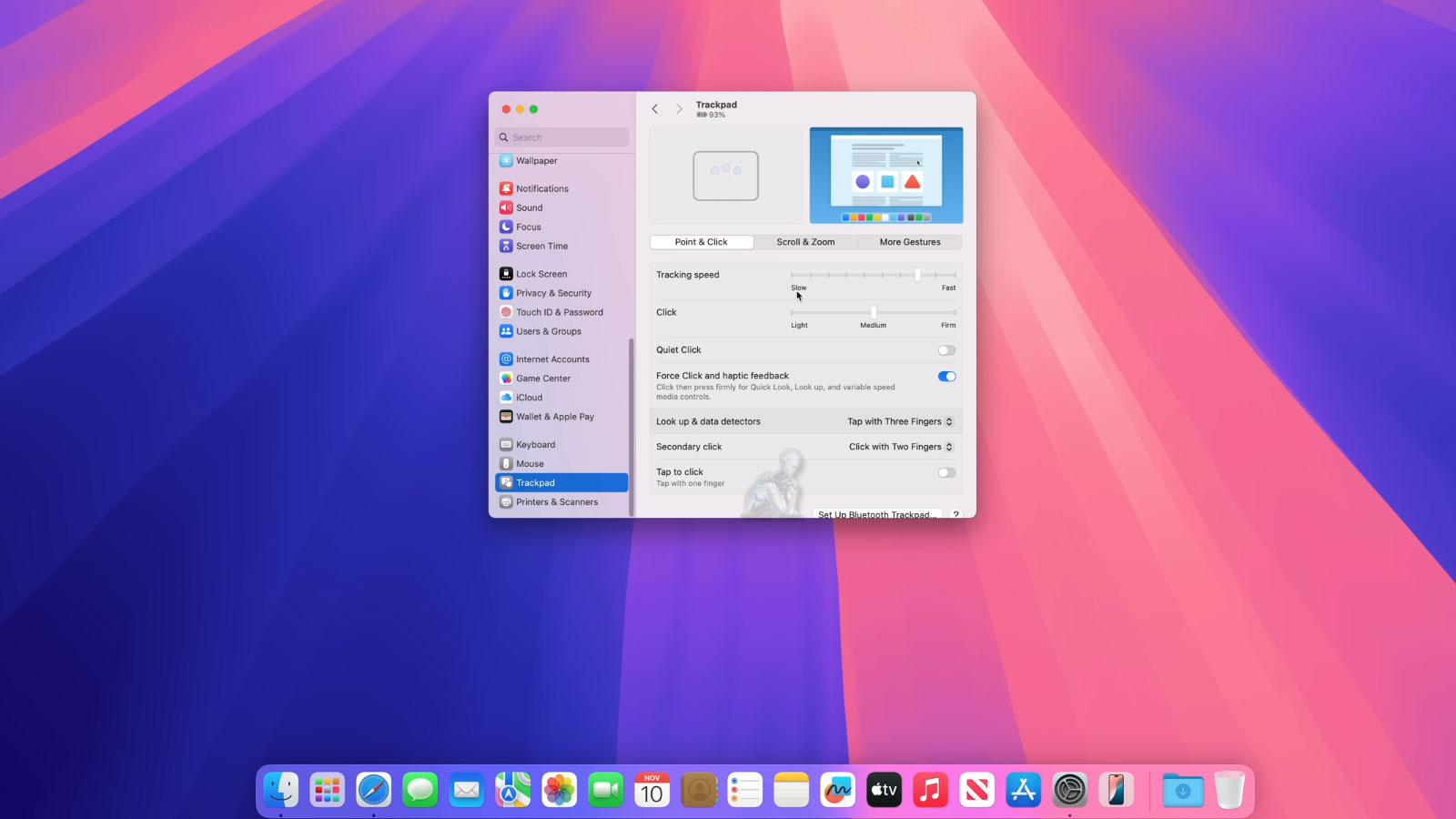 iMac screen displaying trackpad settings during initial macOS setup configuration