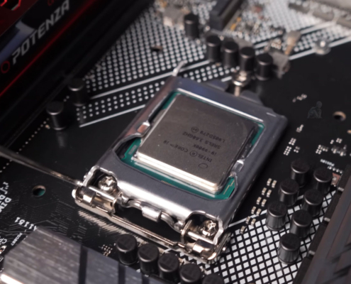 CPU being removed from a desktop computer during hardware repair and component replacement.